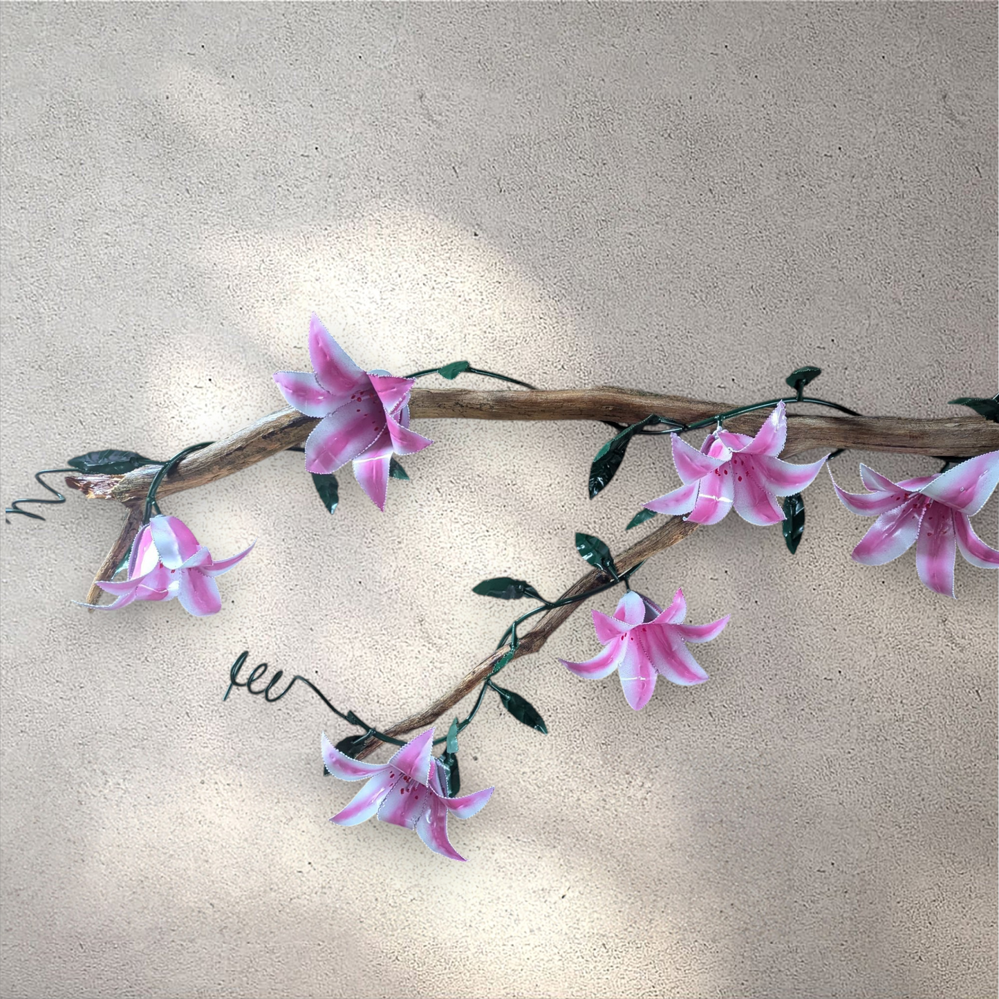 Lily vine wrapped around a piece of cedar
