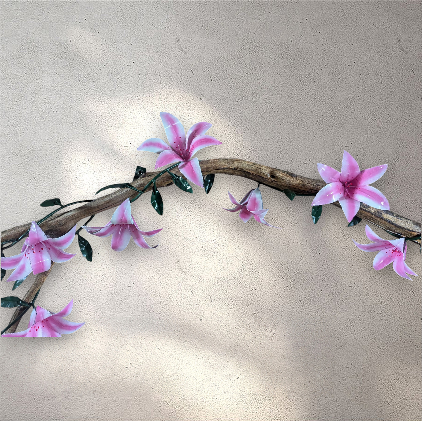 Lily vine wrapped around a piece of cedar