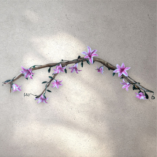 Lily vine wrapped around a piece of cedar